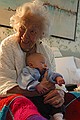 Zeke gets some great grandmother lap time.