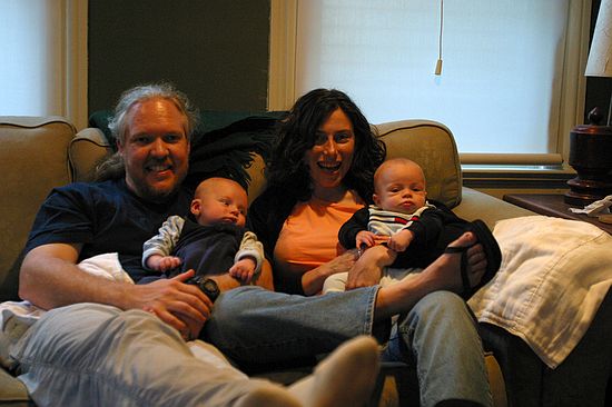 The family unit on the couch.