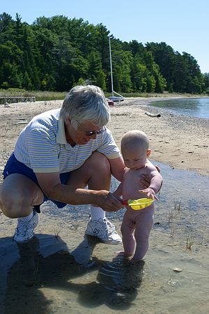 Gus gets some water time with Grandma.