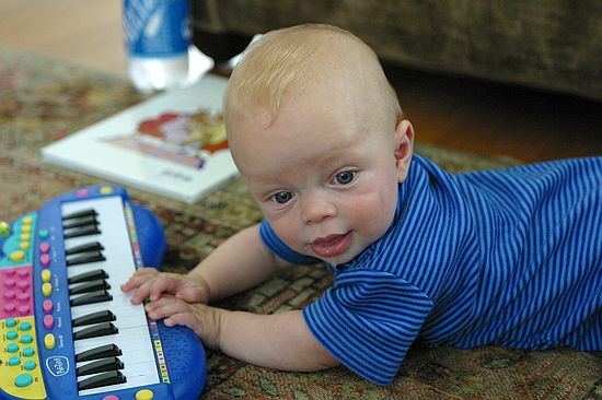 Zeke tickles the keys.