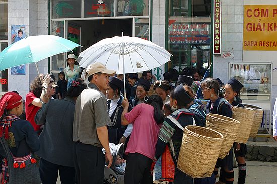 The boys attact a crowd whenever the wheels stop rolling.