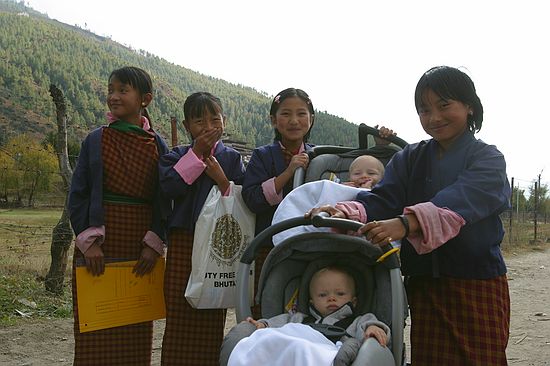 Young girls walking home from school.