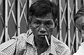 Burmese domino player.