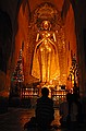 Praying at Ananda Paya.