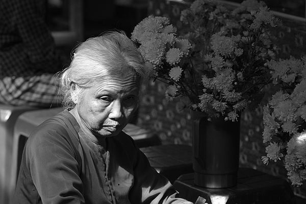 Flower sales woman in Hoi An.