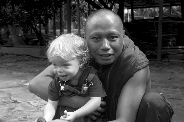 Zeke mugs with a monk.