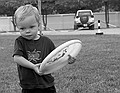 Zeke gives the disk a hurl.