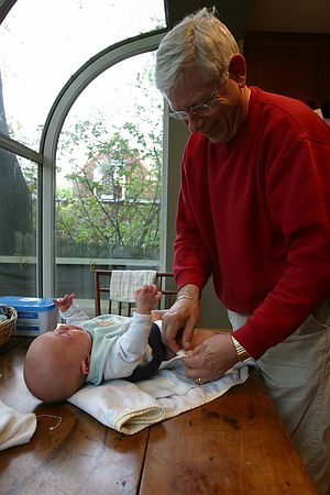 Mike changes a diaper.